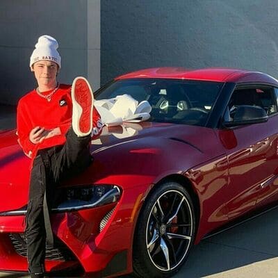 Payton Moormeier With Car Red Toyota Supra